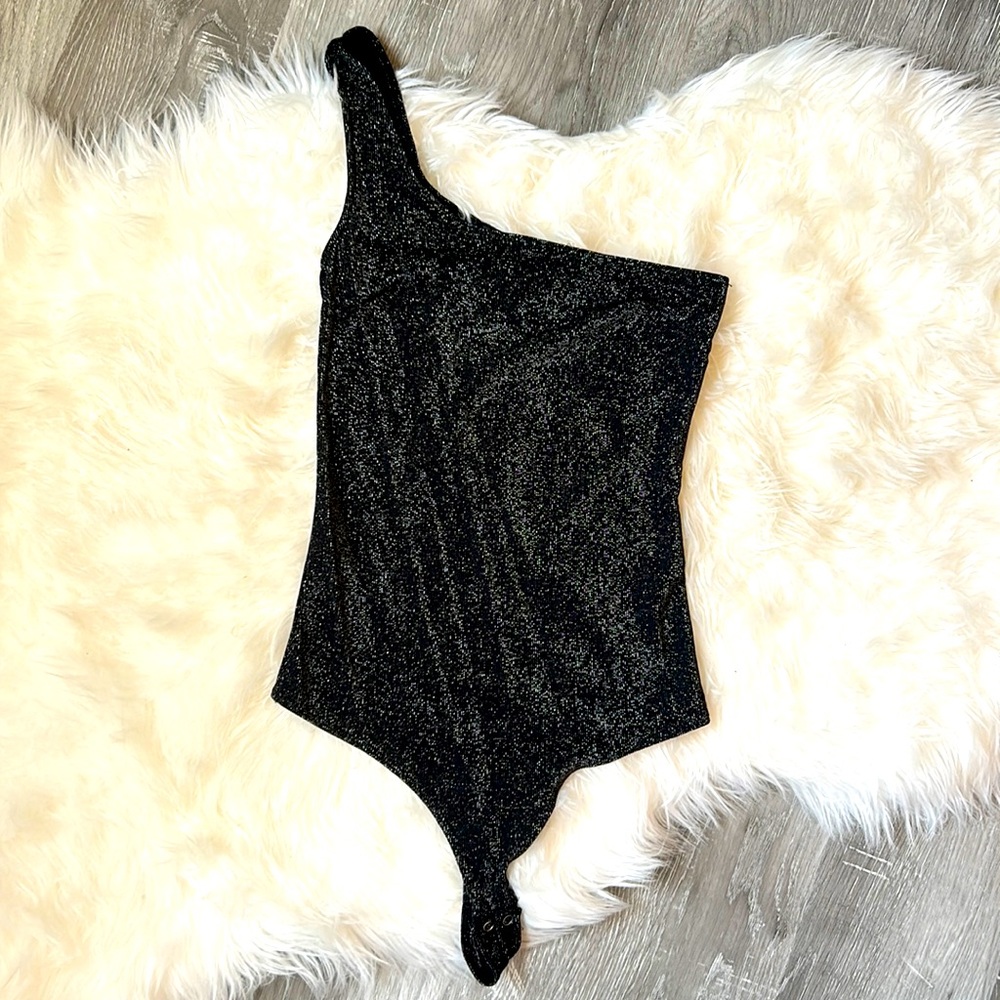 One shoulder, sparkly bodysuit from Dynamite.